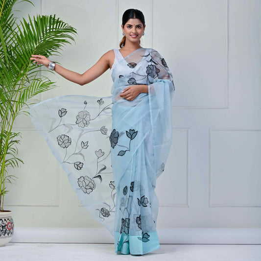 Pale turquoise black floral sequin saree