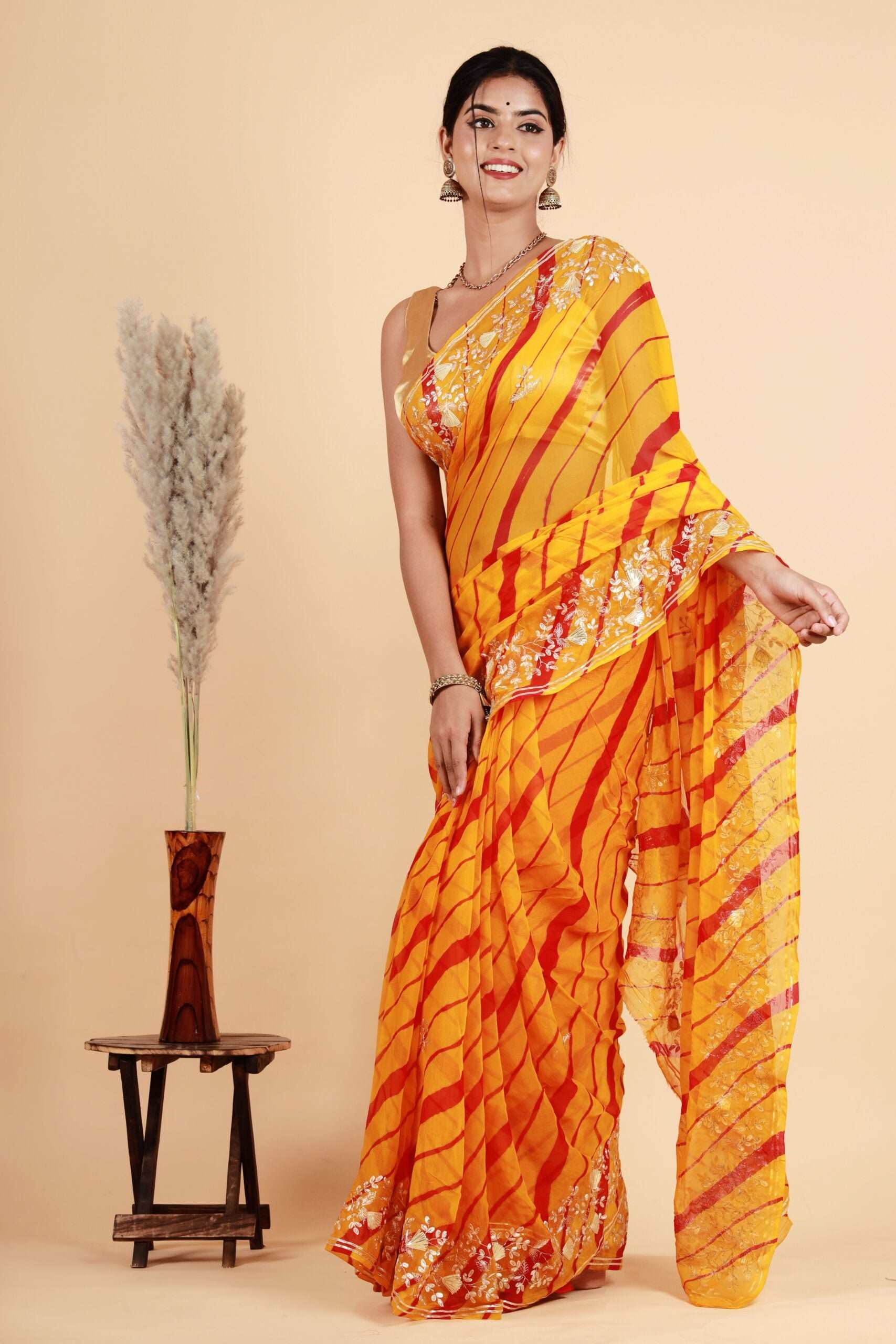 Pure Chiffon Yellow color saree with Pittan work