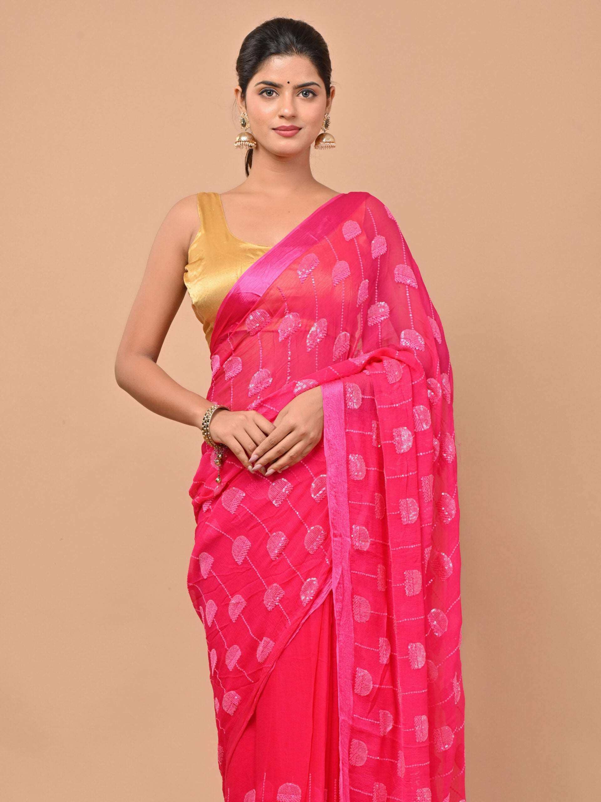 Bright Rani Pink Pure chiffon Rani pink color saree embellished with thread and sequins ...