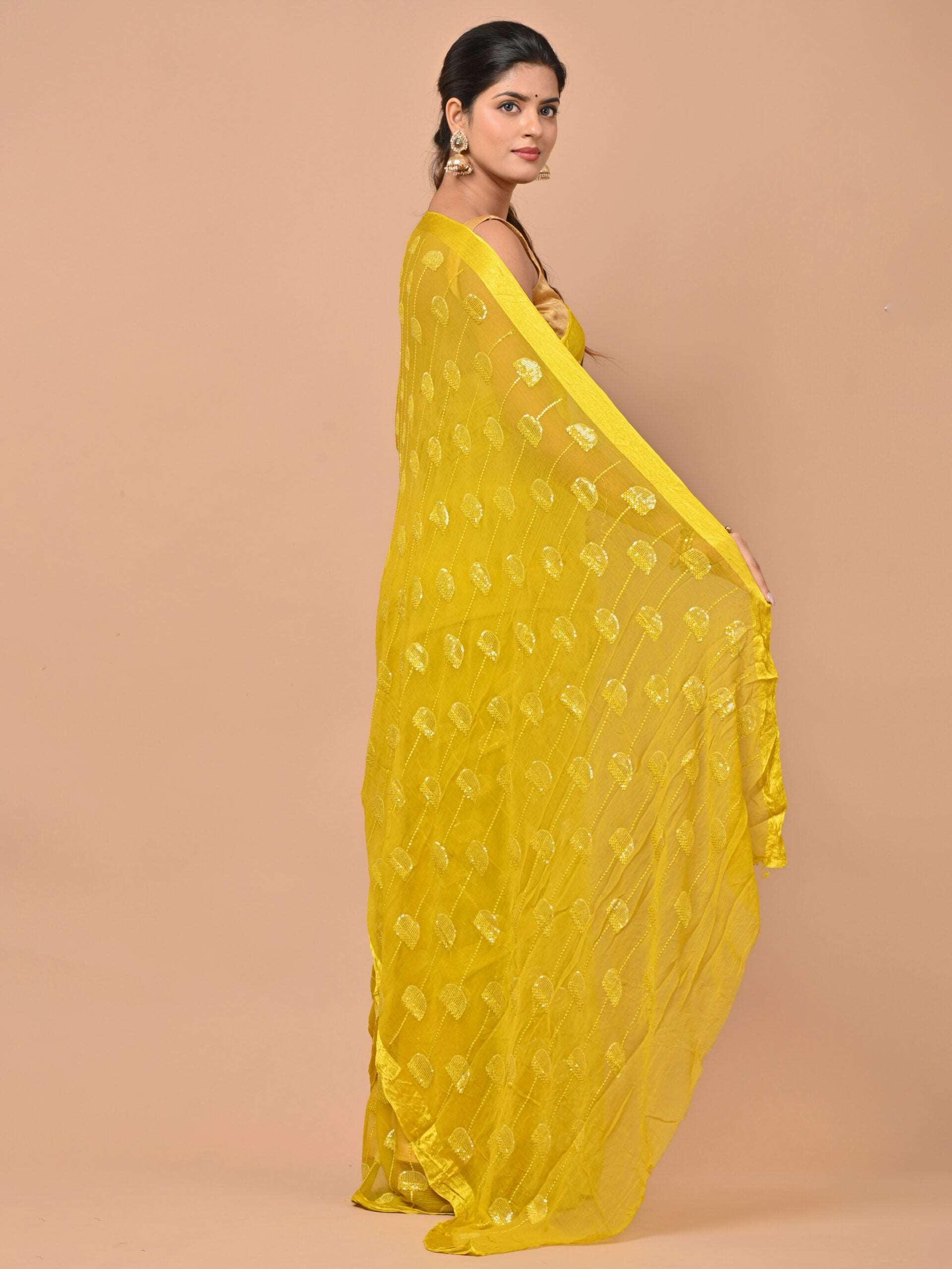 Pure chiffon Yellow color saree embellished with thread and sequins